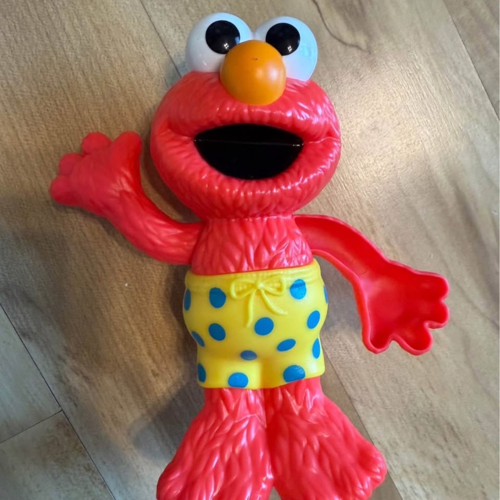 Brand New Elmo water or bath toy!